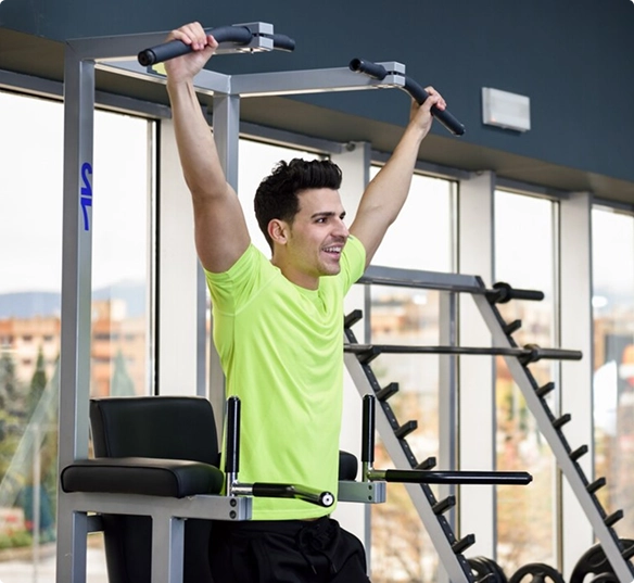 man-stretching-inside-gym