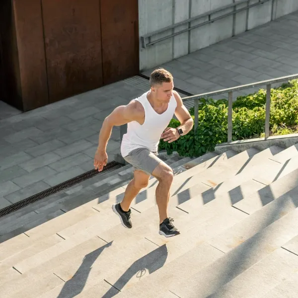 athletic-man-running-stairs-outdoors athletic man running stairs outdoors