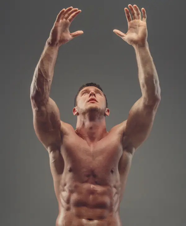 muscular-shirtless-athlete-isolated-grey-background muscular shirtless athlete isolated grey background