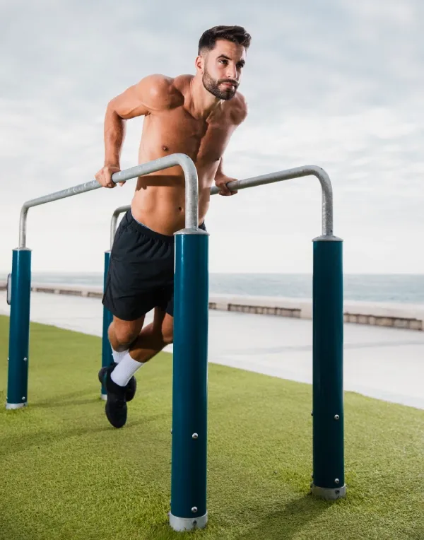 young-man-exercising-routine-outdoor young man exercising routine outdoor