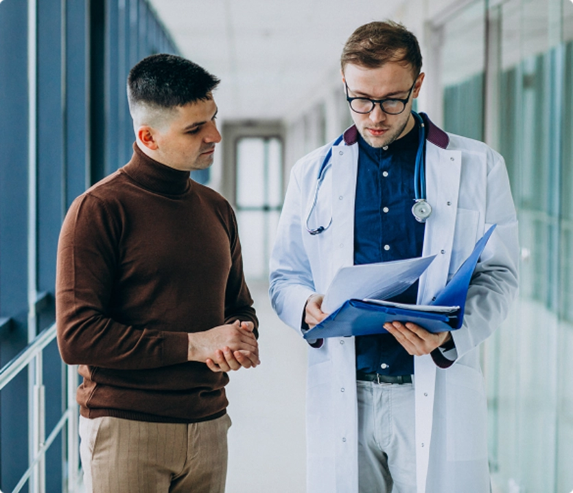 Doctor talking with his patient Safety & Medical Oversight