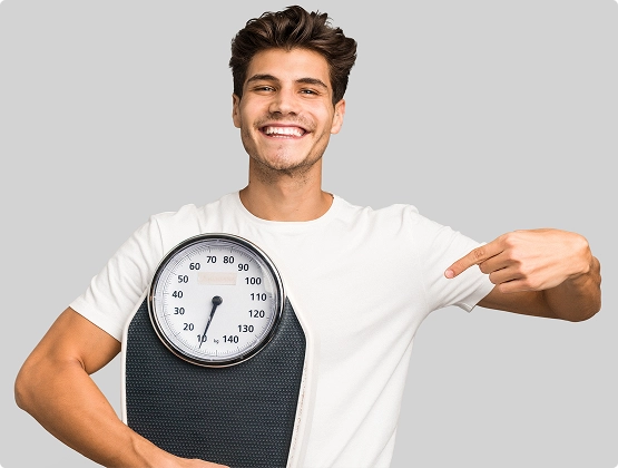 Young man with weighing scale for tirzepatide weight loss