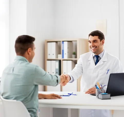 Doctor greeting patient during trt consultation visit