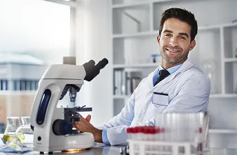 Lab technician conducting blood test for trt cost evaluation